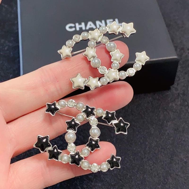 Ch**el brooches